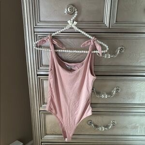 BLUSH PINK BODYSUIT WITH 🎀’s